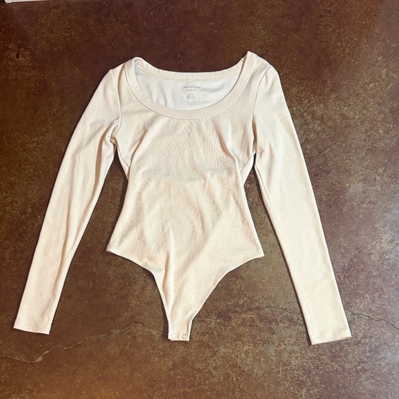 American Eagle Outfitters Tops - American Eagle Outfitters Women's Cream long sleeve body suit. Never worn.